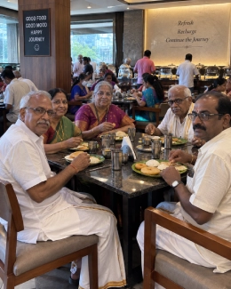Pilgrims enjoying breakfast at the hotel fresh-up stop